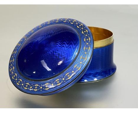 A striking Norwegian silver-gilt and engine-turned guilloche enamel box, David-Andersen, Oslo, c. 1920/30, of circular form, 