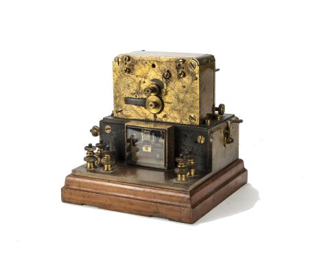 ANNOUNCE THIS LOT IS A RECORDING GALVENOMETER
Morse recorder: in lacquered brass, ebonite and mahogany case, with stud select