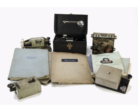 Manuals and other items: a Morse key by Marconi Marine, another by Siemens, six various Marconi manuals, a rotary transformer