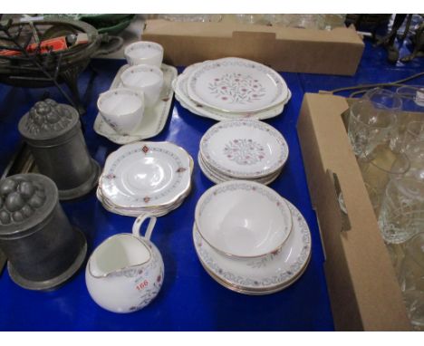 TEA SET BY FOLEY IN THE PERSIAN PATTERN COMPRISING SANDWICH PLATES, CUPS, SAUCERS, SUGAR BOWL, MILK JUG ETC