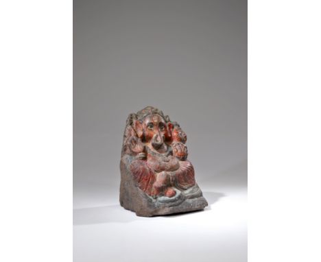 Painted stoneIndia , 18th centuryDimensions: 22 cm by 17 cm by 18 cmWeight: 6235 gramsStatue of seated Ganesha on throne. One