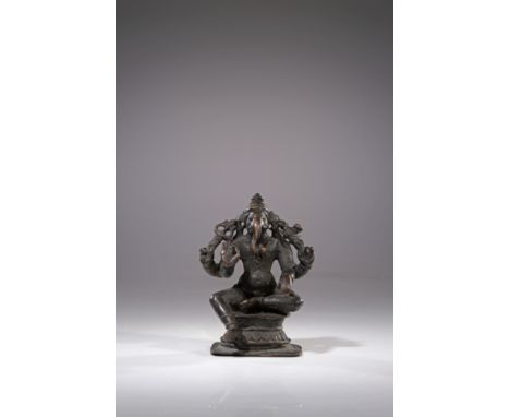 BronzeIndia , 18th centuryDimensions: Height 7 cm Wide 5 cm Depth 4,5 cmWeight: 176 gramsSeated Ganesha on lotus flower thron