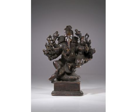 BronzeIndia , 18th centuryDimensions: Height 11 cm Wide 9 cm Depth 5 cmWeight: 700 gramsSeated Ganesha on square base, his va