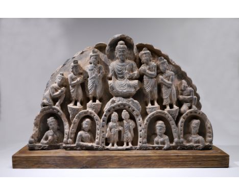 Grey schistGandhara Ca. 200-300 ADDimensions: 60,5 cm by 38,5 cm by 8 cm without standWeight with stand: 25KgA decorative ele