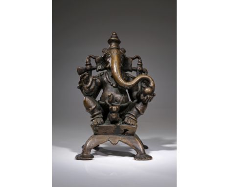 BronzeIndia , 18th centuryDimensions: Height 18 cm Wide 12 cm Depth 10 cmWeight: 2282 gramsThe Remover of Obstacles is seated