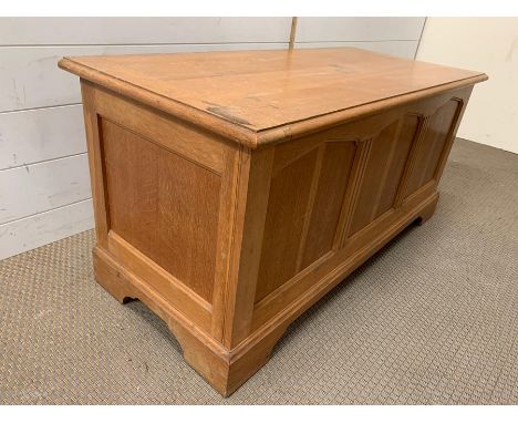 A light oak three panel coffer (H49cm W105cm D47cm)