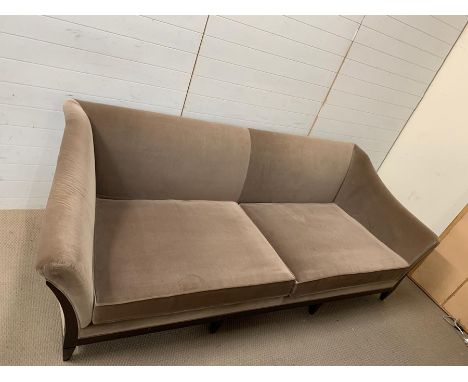 A three seater designer sofa (H90cm W263cm D100cm Seat Height 43cm)