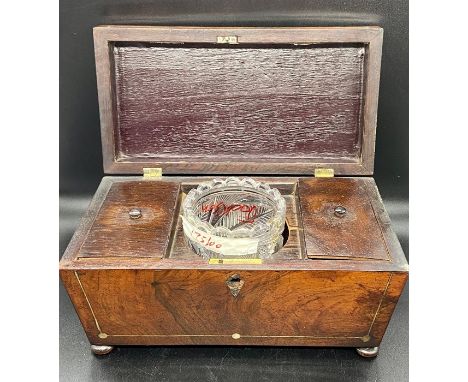 A Mahogany Tea caddy with mother of pearl decoration and glass mixing bowl.