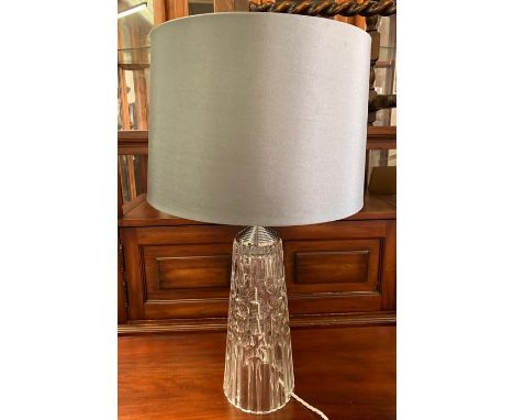 A cut glass table lamp with grey shade 