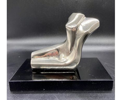 A nude sculpture on base by R. Nour 154/1000