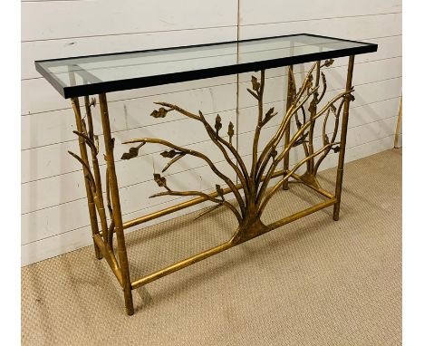A gilt metal console table with glass top and tree design to centre (H80cm W120cm D40cm)