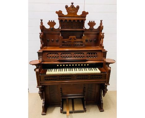 A vintage pipe organ in a mahogany case by O'Nicklin and Sons (H190cm W114cm D60cm)