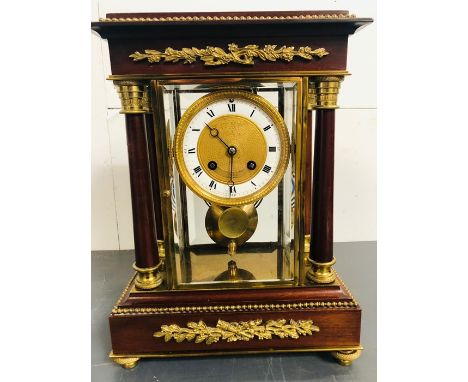 A Late 19th Century mahogany and Ormolu Four glass mantel clock with eight day striking movement Circa 1860 