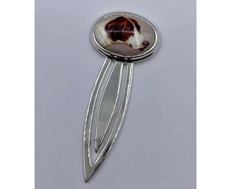 A Silver and enamel bookmark