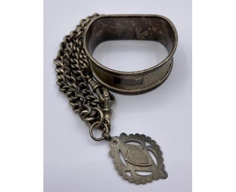 Hallmarked silver napkin ring and Albert chain.