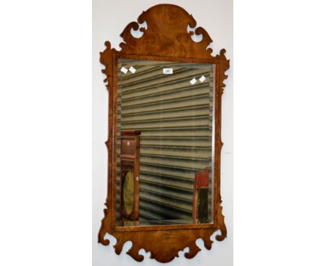 A reproduction burr walnut framed Vauxhall style wall mirror.