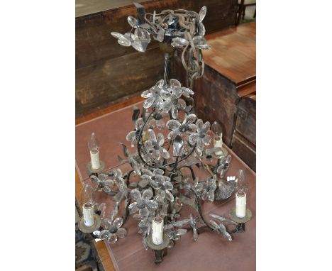 A wrought iron six light electrolier