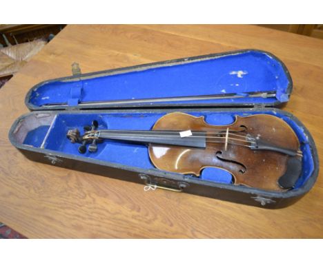 A violin, in fitted case, bearing the label Antonio Stradivarius 
