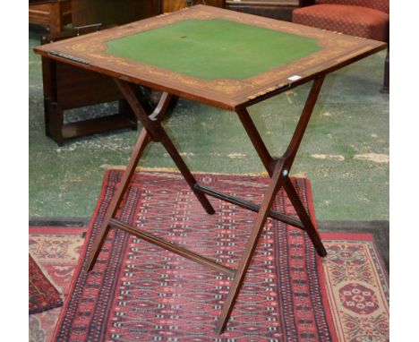 An Edwardian mahogany and marquetry patent closing upright card table, by W. Thornhill & Co, New Bond Street, London, folding