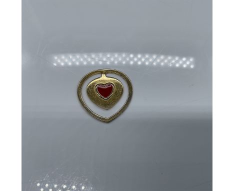 Judith Leiber enamel heart money clip featuring a red and gold heart design. Measures 1.5"H. Known for her iconic luxury acce