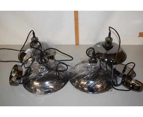 A group of four as new industrial style pendant light fittings