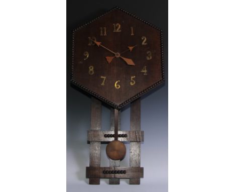An Arts &amp; Crafts oak wall clock, hexagonal dial applied with brass Arabic numerals, beaded borders, 79cm high, c.1930 
