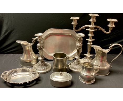 An EPNS two branch candelabra; a continental pewter mug; a pair of continental Zinh pewter alloy jugs, candlesticks, tray, pi