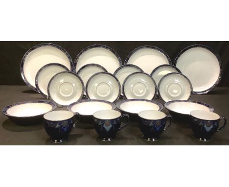 A Denby Baroque pattern tea service for four with cups and saucers, dinner plates, side plates and bowls 