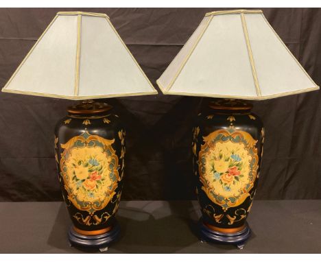 A pair of continental style ovoid lamp bases, printed in the 18th century taste, hexagonal green shades, 63cm overall 