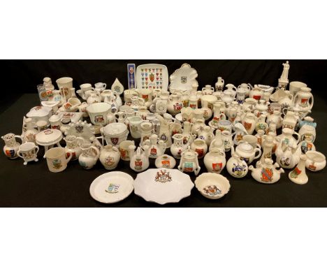 A collection of Carlton China Lucky White Heather souvenir ware and crested china, Goss, etc, including Ferris wheel, vases, 