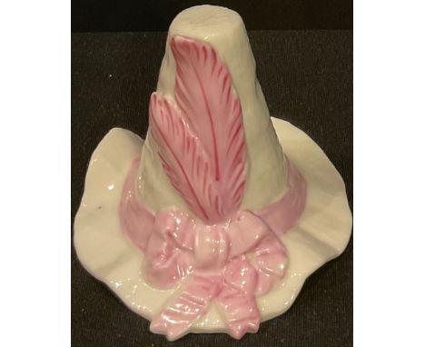 A Worcester Royal China Works candle snuffer, Tyrolean Hat, with pink feather and ribbon, 6.5cm 