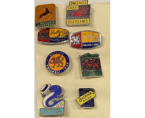 A collection of 1950's/60's Butlins enamel badges, Pwllheli, Minehead, Skegness, Filey (8) 