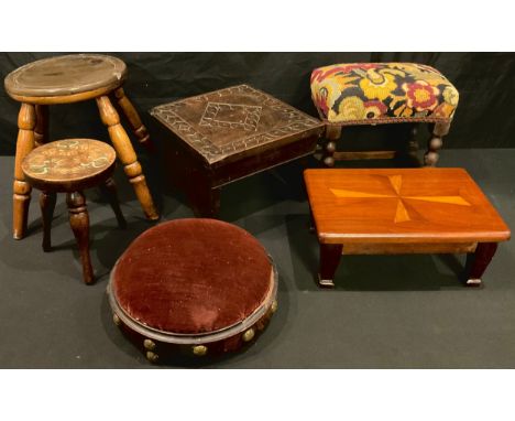 A Georgian milking stool; an Arts and Crafts period mahogany apprentice piece table, inlaid with Maltese Cross; an Arts and C