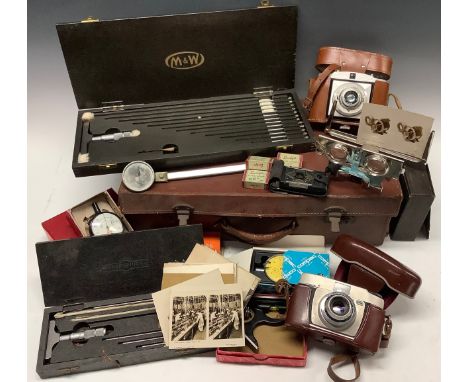 A stereoscopic viewer, T.C. &amp; E.C. Jack, Edinburgh, boxed with cards, some depicting scientific equipment; an Ensign Midg