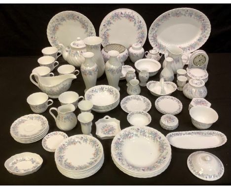 A Wedgwood Angela pattern tea set, teapot, milk and sugar, assorted vases, jugs, mantel clock, oval meat plate, gateau plate,