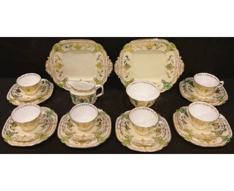 A Royal Crown Derby 9917 pattern tea set comprising six teacups and saucers, six tea plates, milk jug, sugar bowl, pair of sa