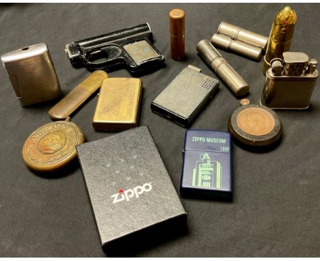 A collection of cigarette lighters, including WWI German'Gott Mit Uns', bullet shaped Trench Art lighter, Ronson, etc (14) 