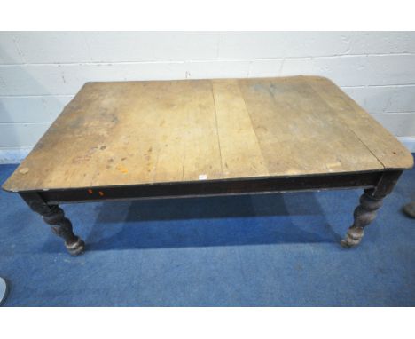 A 19TH CENTURY PINE FARMHOUSE TABLE, with a single drawer to one end, raised on turned legs, and ceramic castors, length 175c