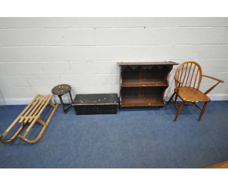 LUCIAN ERCOLANI, A MID CENTURY ELM AND BEECH WINDSOR ARMCHAIR, an oak wall hanging plate rack, a black painted chest, a small