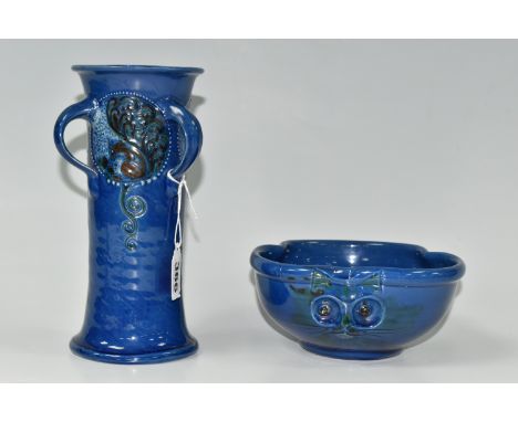 A C H BRANNAM BARUM POTTERY VASE AND BOWL, the three handled vase of tapered cylindrical form, decorated in relief with squir