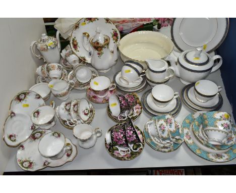 A GROUP OF ROYAL ALBERT TEA WARE, comprising an 'Old Country Roses' pattern coffee pot and cake plate, a Paragon 'Country Lan