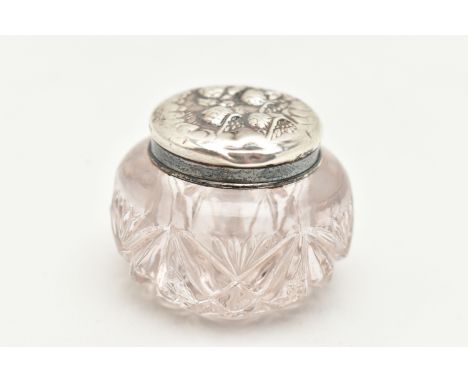 AN EDWARDIAN SMALL SILVER LIDDED GLASS DRESSING TABLE JAR, embossed cherub detailed cover, hallmarked 'Boots Pure Drug Compan
