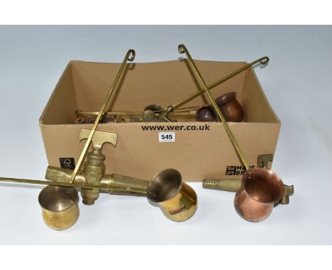 A BOX OF BRASS AND COPPER WARES, to include six spirit measures, four brass beer taps, two marked 'Fiddian' and 'Veribst', va