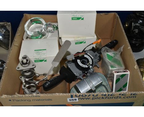 A BOX OF LUCAS COMPANY ITEMS to include a cast iron car ashtray, six packs of Lucas branded playing cards, a commemorative sc