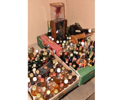 ALCOHOL, Two Boxes containing a bottle of MARTELL *V*S* Fine Cognac a novelty cart bottle of Cypriot Brandy, a bottle of Bouz