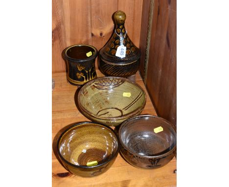 A GROUP OF MOSTLY COXWOLD POTTERY VESSELS comprising two brown bowls to include a tube lined oak leaf band to the exterior an