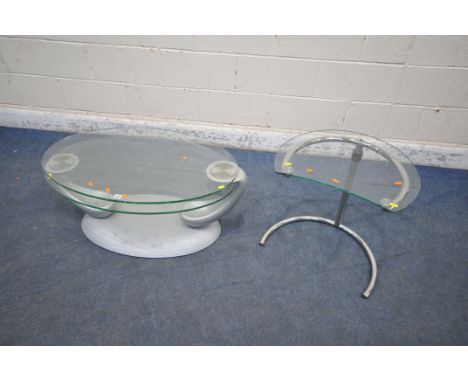 A PAPILLON COUCHTISCH CONTEMPORARY GLASS AND METAL COFFEE TABLE, with twin oval glass moving top, width 95cm x depth 54cm x h