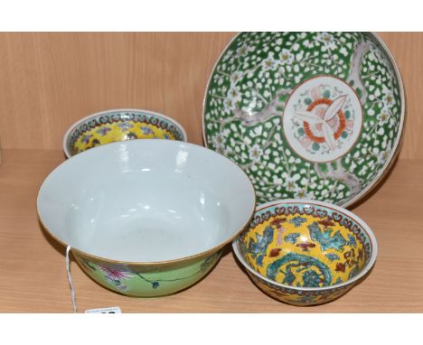 FOUR 19TH &amp; 20TH CENTURY CHINESE AND JAPANESE PORCELAIN BOWLS, comprising an ogee shaped bowl, the textured green ground 