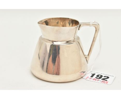 A GEORGE V SILVER MILK JUG, polished tapering jug with handle, hallmark rubbed, London 1913, signed to the base 'Winsor Bisho
