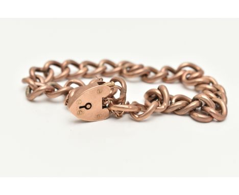A 9CT ROSE GOLD CURB LINK BRACELET, hollow links stamped 9ct, fitted with a heart padlock clasp and additional safety chain, 